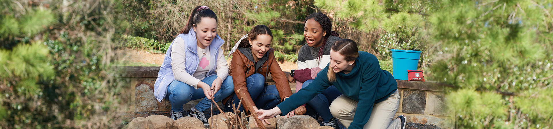  group of young girl scouts outside cheering 